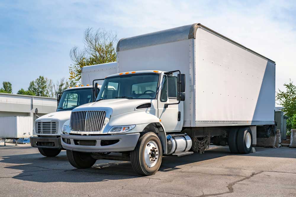 Two box trucks | Aguirrie Paint & Body